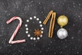 New Year background of snowflakes, sweets, candies, cinnamon, balls number year 2018 Royalty Free Stock Photo