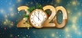 New year blue sparkling background with 2020 numbers and golden clock. Holiday dynamic design elements for banner and poster.