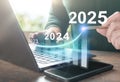 2025 new year. Business plan 2025 new year. Man working on laptop with growth chart 2025. Start new year 2025 with goal plan, goal Royalty Free Stock Photo