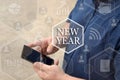New Year, button on the touch screen with a blur background of t Royalty Free Stock Photo