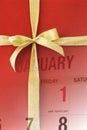 New year calendar page on red gift box