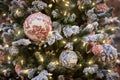 New Year card. Balls and garland with lights on the Christmas tree