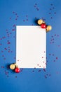 New Year card. Christmas concept with envelope and balls on a blue background Royalty Free Stock Photo