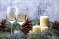 New Year card design with two glass-wine, candles and christmas Royalty Free Stock Photo