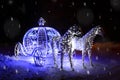 New Year card. luminous figure of horses with a carriage. Snow, night. Place for text Royalty Free Stock Photo