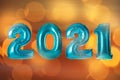 2021 New Year celebration. Bright balloons and blurred lights on background Royalty Free Stock Photo