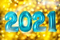 2021 New Year celebration. Bright balloons and blurred lights on background Royalty Free Stock Photo