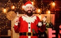 New year celebration. Celebrate winter holidays. Indulge yourself in joy. Man bearded santa celebrate christmas with Royalty Free Stock Photo