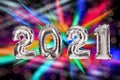 2021 New Year celebration. Creative design with bright balloons and blurred lights Royalty Free Stock Photo