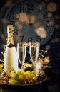 New year celebration with grapes and champagne