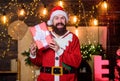 New year celebration. Santa claus hold gift box. Man bearded santa celebrate christmas with presents. Celebrate with joy