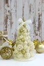 New year, Christmas card.New Year, Christmas background, rustic style. Festive Christmas tree in gold on white wood background and Royalty Free Stock Photo