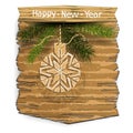 New Year or Christmas banner with Christmas-tree patterned ball and branches of spruce on a wooden panel. Isolated element on