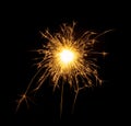 New Year or Christmas bengal fire, sparkler fireworks candle isolated on a black background Royalty Free Stock Photo