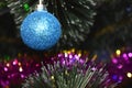 New Year and Christmas, blue ball hanging on the Christmas tree, postcard Royalty Free Stock Photo