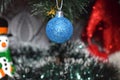 New Year and Christmas, blue ball hanging on the Christmas tree, postcard Royalty Free Stock Photo