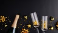 New Year or Christmas celebration concept. Flat lay composition with champagne bottle, drink glasses, golden balls decorations and Royalty Free Stock Photo