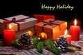 New Year or Christmas decorations with gift boxes, candles and balls. greeting card. Happy holidey.