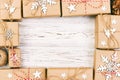 New Year and Christmas Frame Composition. handmade wrapped christmas gift boxes with decoration on white background with empty Royalty Free Stock Photo