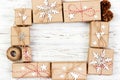 New Year and Christmas Frame Composition. handmade wrapped christmas gift boxes with decoration on white background with Royalty Free Stock Photo