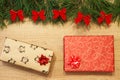 New Year / Christmas gifts in package, tree with red bows on the wooden background template Royalty Free Stock Photo