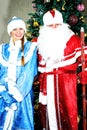 New year and Christmas greetings. Funny snow maiden and Santa Claus. Russian holiday Royalty Free Stock Photo