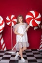 New Year 2020! Christmas, holidays and childhood concept. Merry Christmas, happy holidays! Little girl stands with a huge Christma Royalty Free Stock Photo