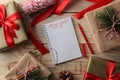 New Year. Christmas. Holidays. Composition with New Year and Christmas gifts and New Year`s letterhead.