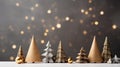 New Year and Christmas minimalistic banner background. Golden Christmas trees on a gray-gold bokeh background. place for text Royalty Free Stock Photo