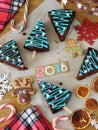 New Year 2018. Christmas pastry, candies and decorations Royalty Free Stock Photo