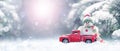 New year christmas snow concept. Happy holiday celebration. Christmas and transportation. Snowman winter with toy truck Royalty Free Stock Photo