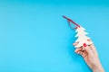 Woman hand holding homemade wooden christmas toy Royalty Free Stock Photo