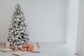 New year Christmas tree holiday gifts white interior winter decor Royalty Free Stock Photo