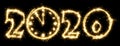 New Year 2020 with clock made by sparkler . Number 2020 and sign written sparkling sparklers . Isolated on a black background . Royalty Free Stock Photo