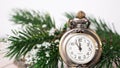 New year clock before midnight. Antique pocket watch on wooden background Royalty Free Stock Photo