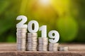 2019 New year on coins stack for saving money and financial planning Royalty Free Stock Photo