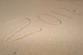 New Year 2017 coming, on a beach sand, summer Royalty Free Stock Photo