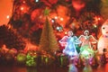 New Year composition of an angel and gold Christmas trees. Soft focus. Little depth of field Royalty Free Stock Photo