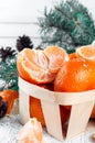 New year composition in basket with mandarins Royalty Free Stock Photo