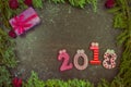 New Year composition with fir-trees, cones and candles Royalty Free Stock Photo