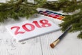 New Year composition with fir-trees, cones with the inscription 2018 Royalty Free Stock Photo