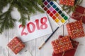 New Year composition with fir-trees, cones with the inscription 2018 Royalty Free Stock Photo