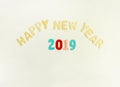 New Year composition with wooden 2019 numbers and letters. Happy New Year festive card. Royalty Free Stock Photo