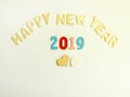 New Year composition with wooden 2019 numbers and letters. Happy New Year festive card. Royalty Free Stock Photo