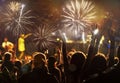 new Year concept - cheering crowd and fireworks