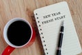 New Year Concept - New year, fresh start text on notepad Royalty Free Stock Photo