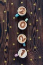 New Year concept Number 2021 in four coffee cups on a brown wooden background Royalty Free Stock Photo