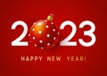 New Year concept - 2023 numbers with Christmas ball on red background for winter holidays design