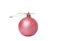 New Year concept. Toy with glitter layer pink on Christmas tree isolate on white Royalty Free Stock Photo