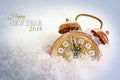 New year 2018 concept, vintage alarm clock in the snow shows fiv Royalty Free Stock Photo